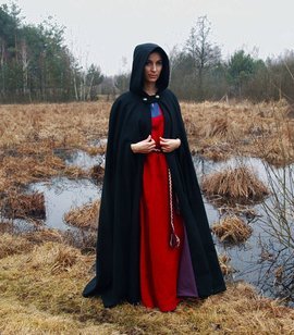 Wool cloak with wide hood, cotton lining and cutouts for hands